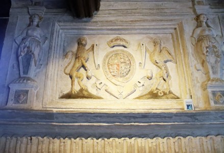 The fireplace in the Great Parlour, showing the coat of arms of Elizabeth I