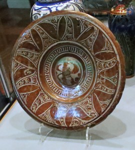 A Hispano-Moresque tin-glazed earthenware dish with lustre. Spain, c.1600.