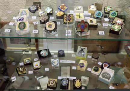 Nurses' badges at the Riverside Museum, Wheeler Building, Chester