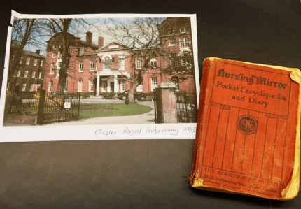 Photograph of the Chester Royal Infirmary in 1968, together with The Nursing Mirror Pocket Encyclopaedia and Diary. Riverside Museum, Chester.